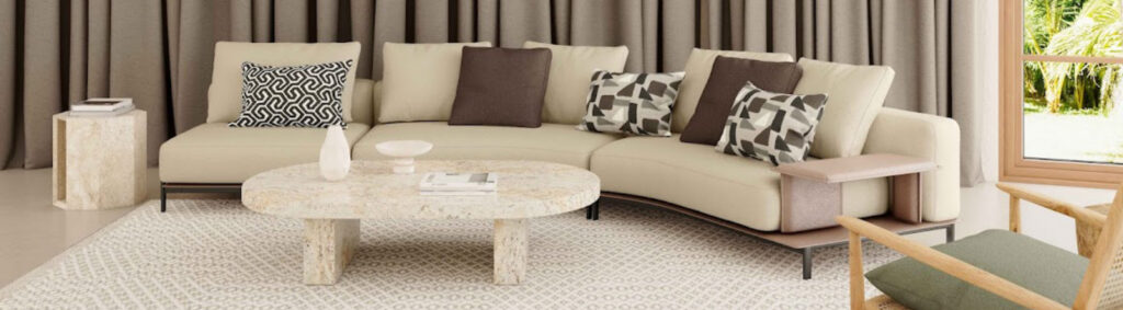 A stylish living room with a comfortable couch, a coffee table, and several chairs for seating and conversation