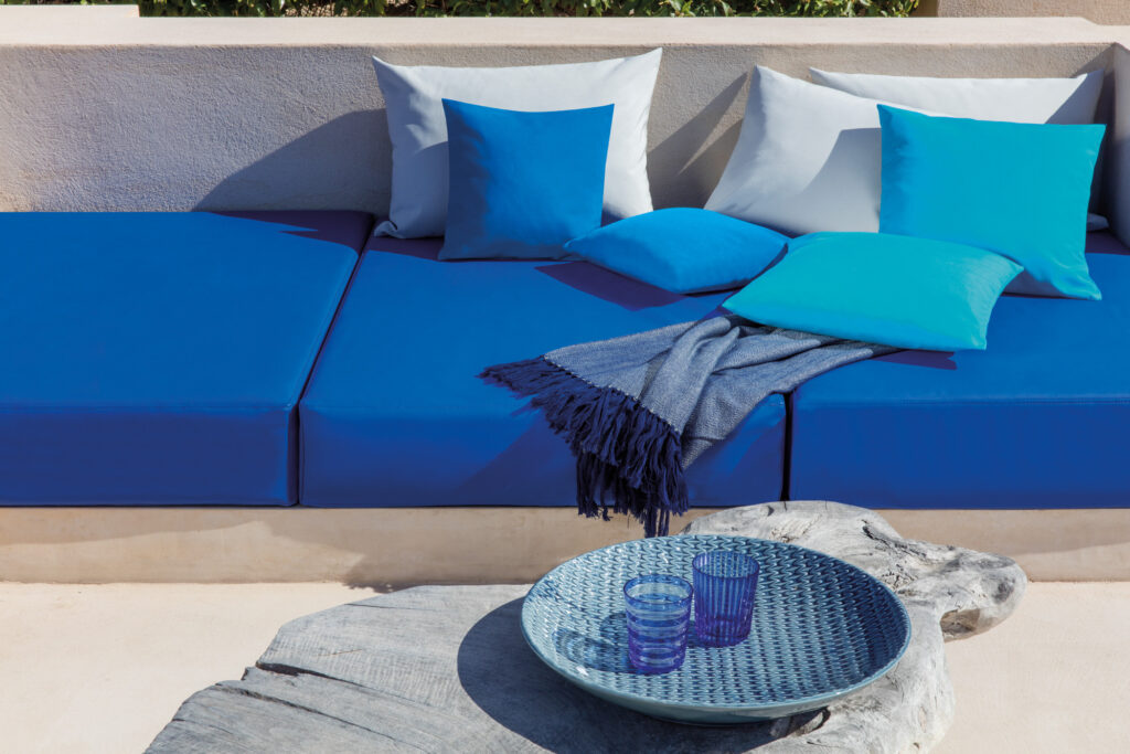 bold blue coloured outdoor chairs with fibreguard colourfast fabric